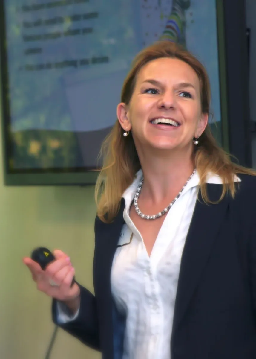 Carri Scuba, leadership and wellness coach, smiling